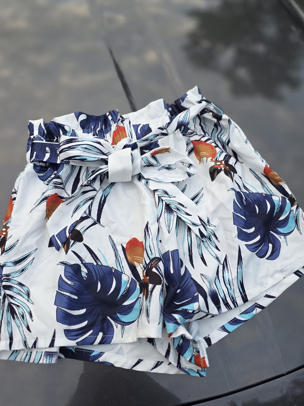White High-Waist Paperbag Shorts with Navy Tropical Print